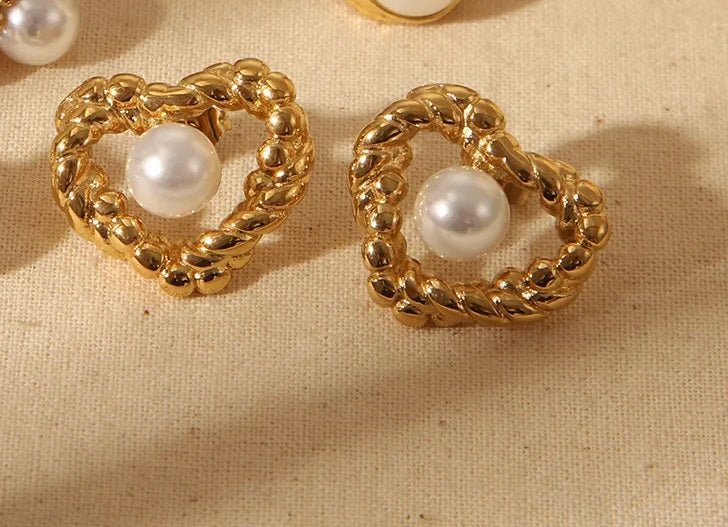 Alam Ara exquisite 18K retro twist pearl heart studs, front view