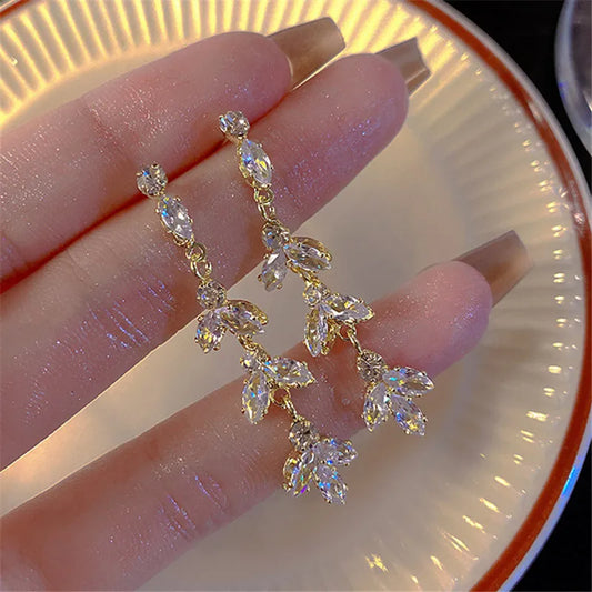 Alam Ara high jewelry zirconia leaf tassel drop earrings, front view