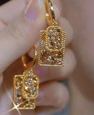 Alam Ara elegant brown zircon dangling earrings, perfect for adding a sophisticated touch.