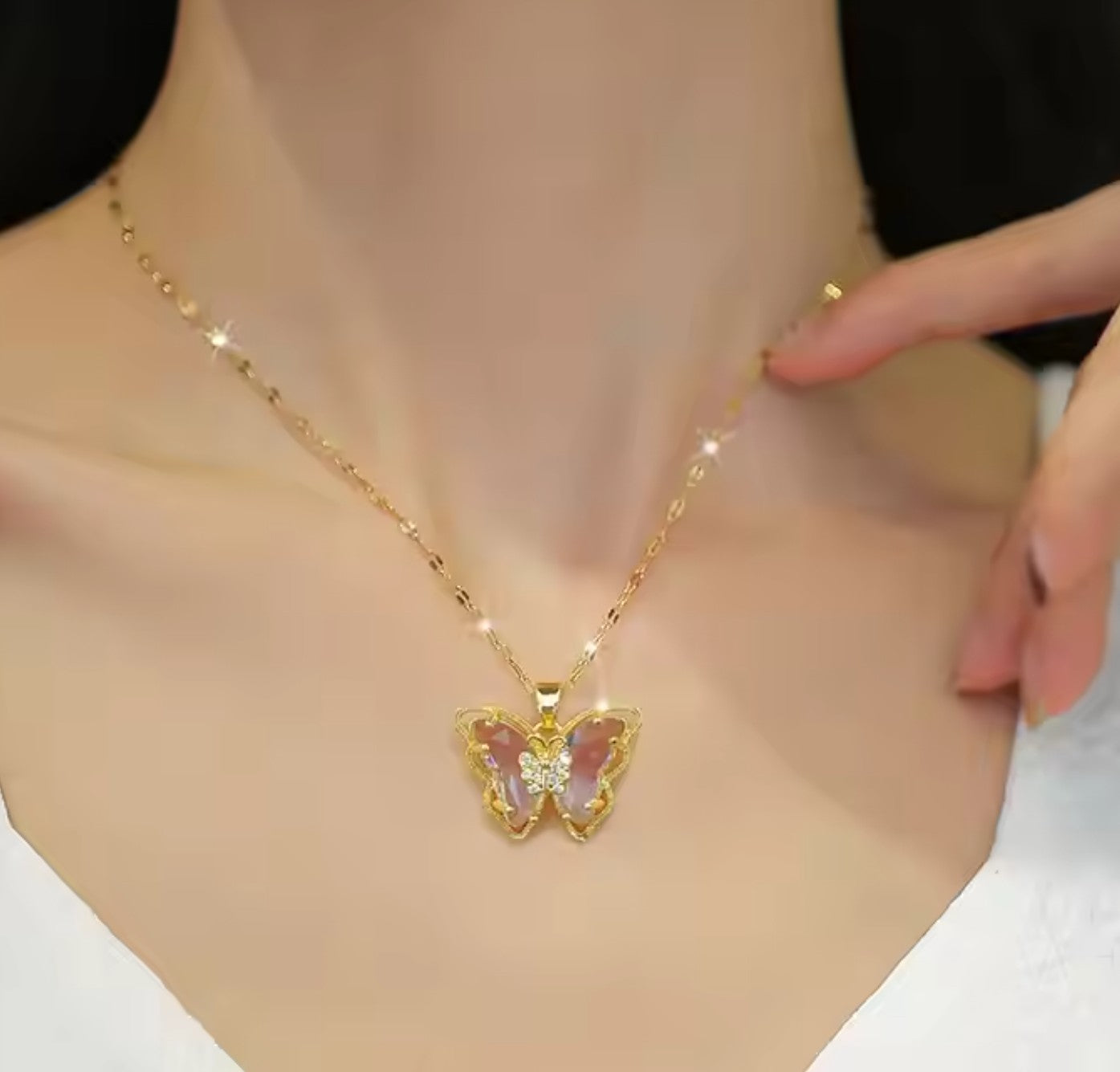 Woman wearing adjustable 18K gold plated butterfly lip chain necklace, showing elegant style