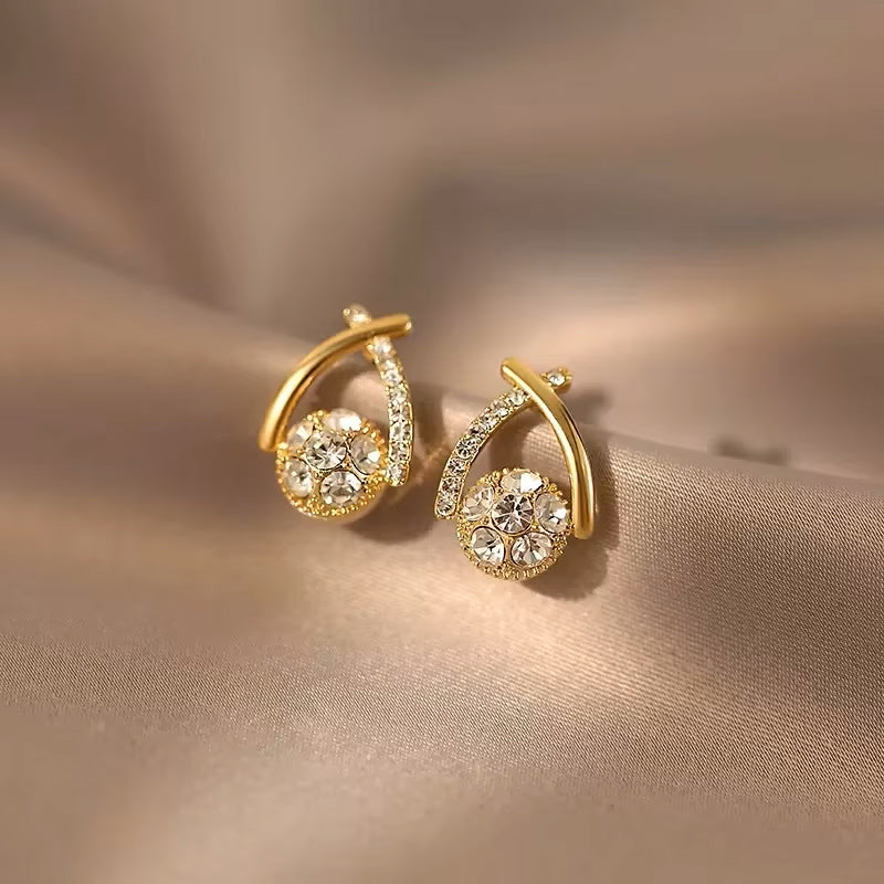Side view of elegant Korean style crystal cross fishtail stud earrings, highlighting craftsmanship
