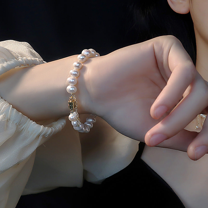 Side view of elegant natural freshwater pearl bracelet, highlighting unique organic pearl shapes