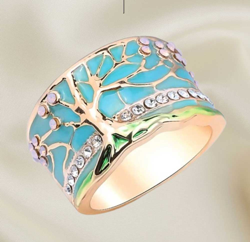 Close up of intricate pink opal and green enamel details on Lucky Flower Tree wide ring