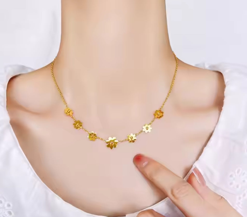 Woman wearing delicate 18K gold plated sunflower daisy pendant necklace, showing fashion style in Pakistan