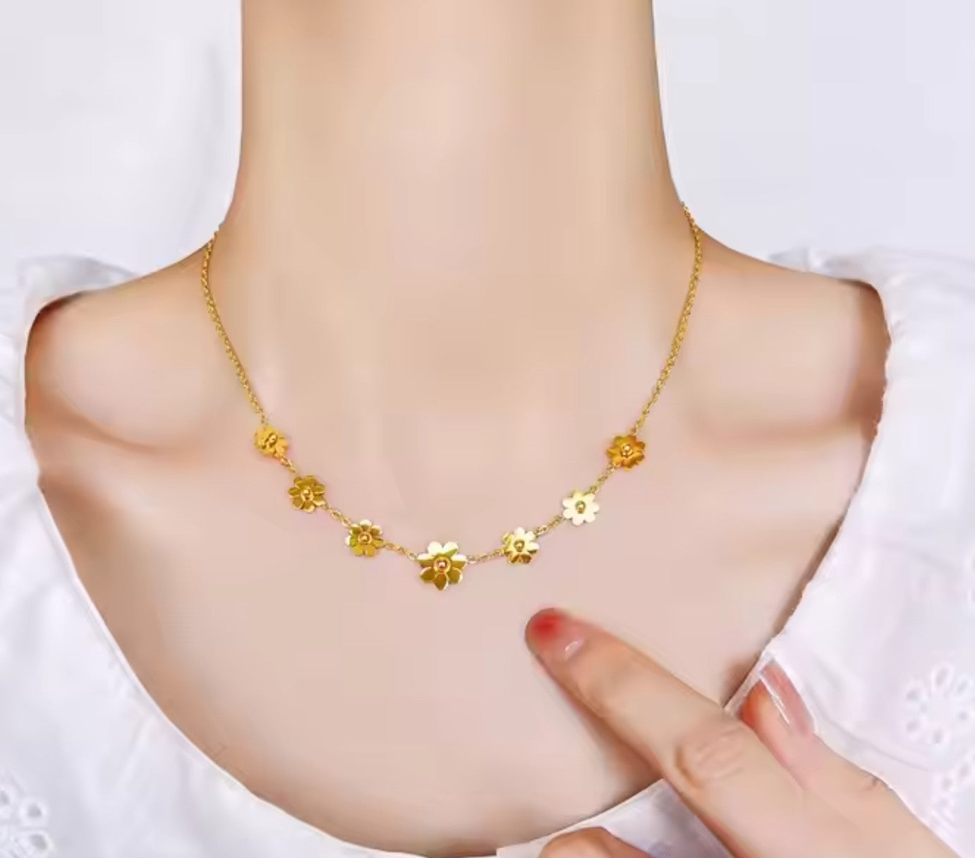 Woman wearing delicate 18K gold plated sunflower daisy pendant necklace, showing fashion style in Pakistan