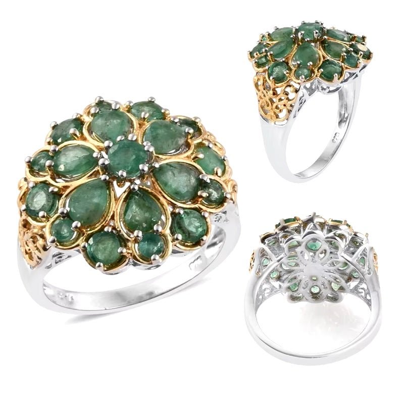 Close up of sparkling green zircon crystals on gold and silver water drop cocktail ring