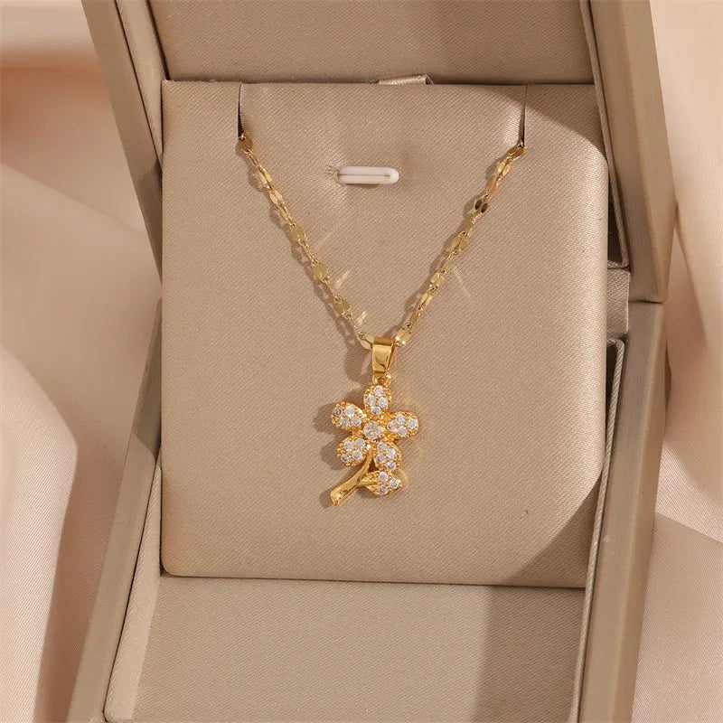 Close up of sparkling zircon crystals on intricate flower pendant necklace design